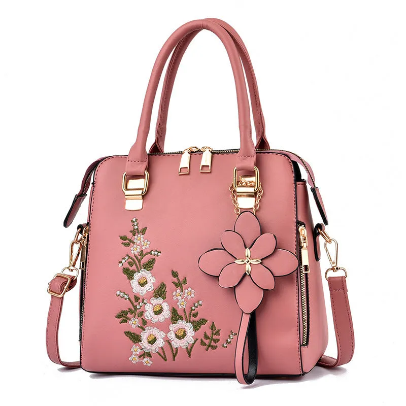 Large embroidered flower handbag for women in horizontal square shape with zipper closure and single strap