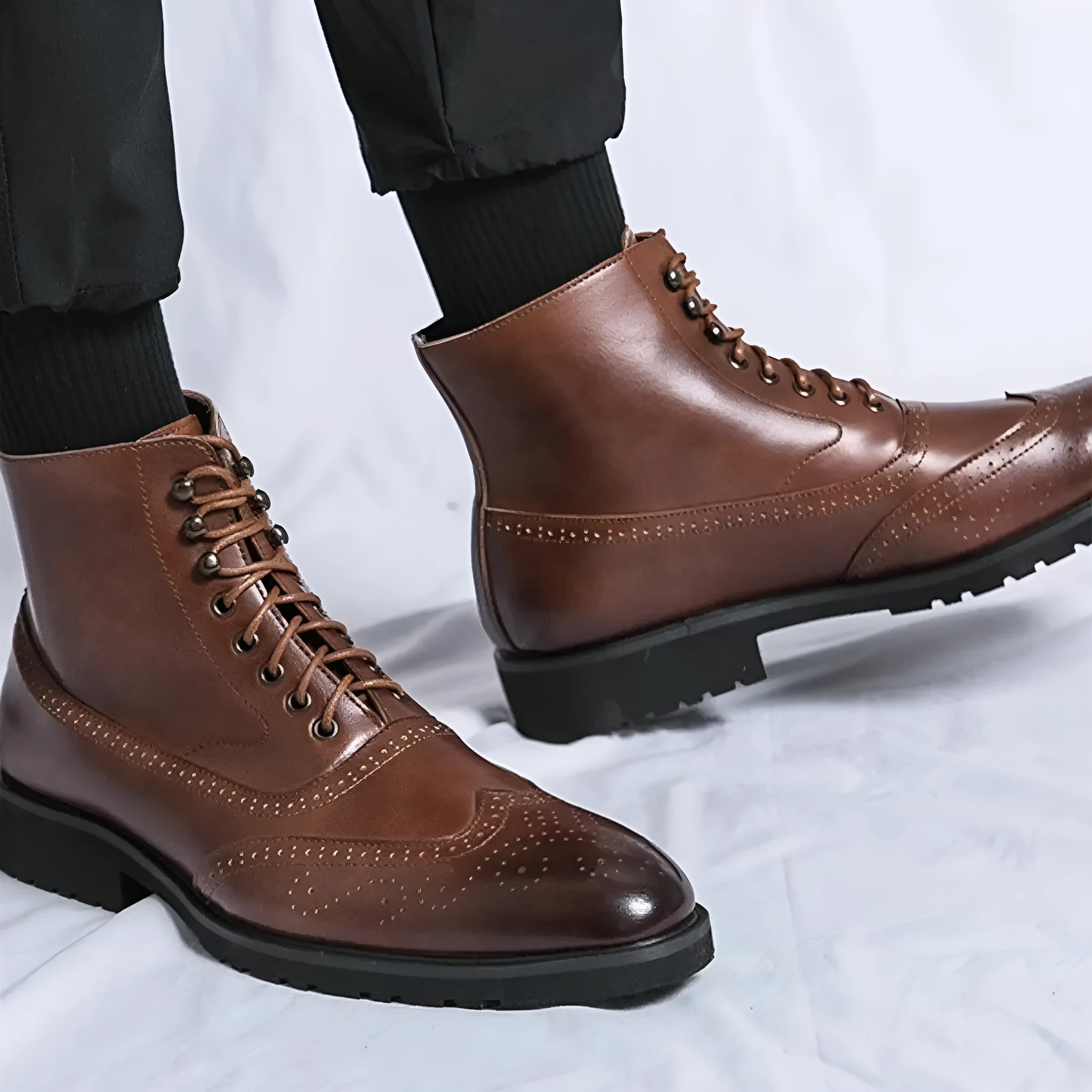 Men's mid top leather work shoes in black with thick sole and sturdy stitching