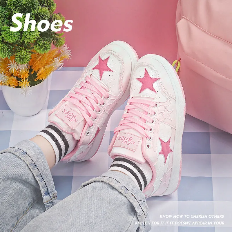 A pair of denim skate shoes with lace-up front, round toe, and flat mid-heel, shown in black.