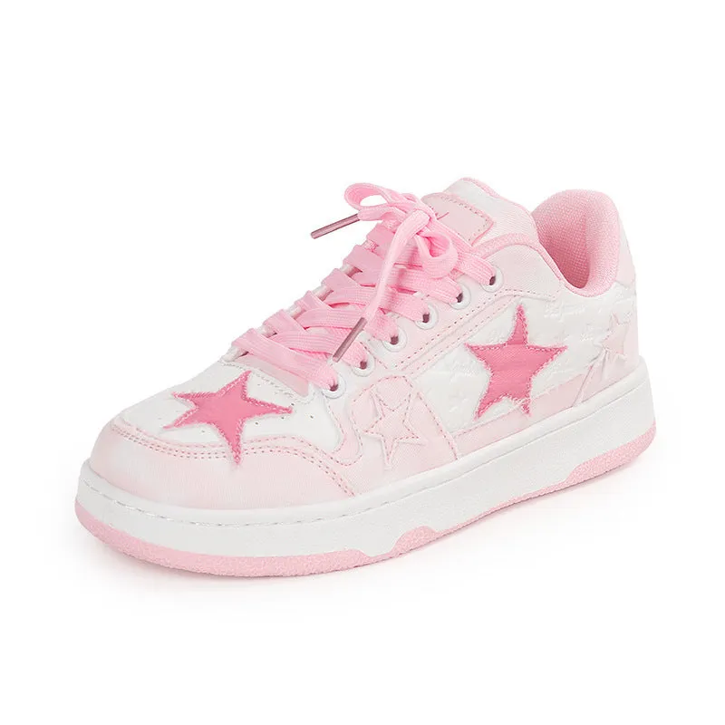 A pair of denim skate shoes with lace-up front, round toe, and flat mid-heel, shown in black.
