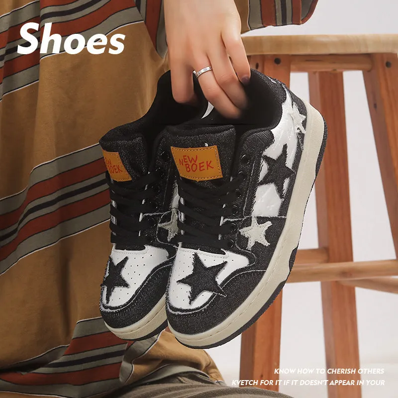 A pair of denim skate shoes with lace-up front, round toe, and flat mid-heel, shown in black.