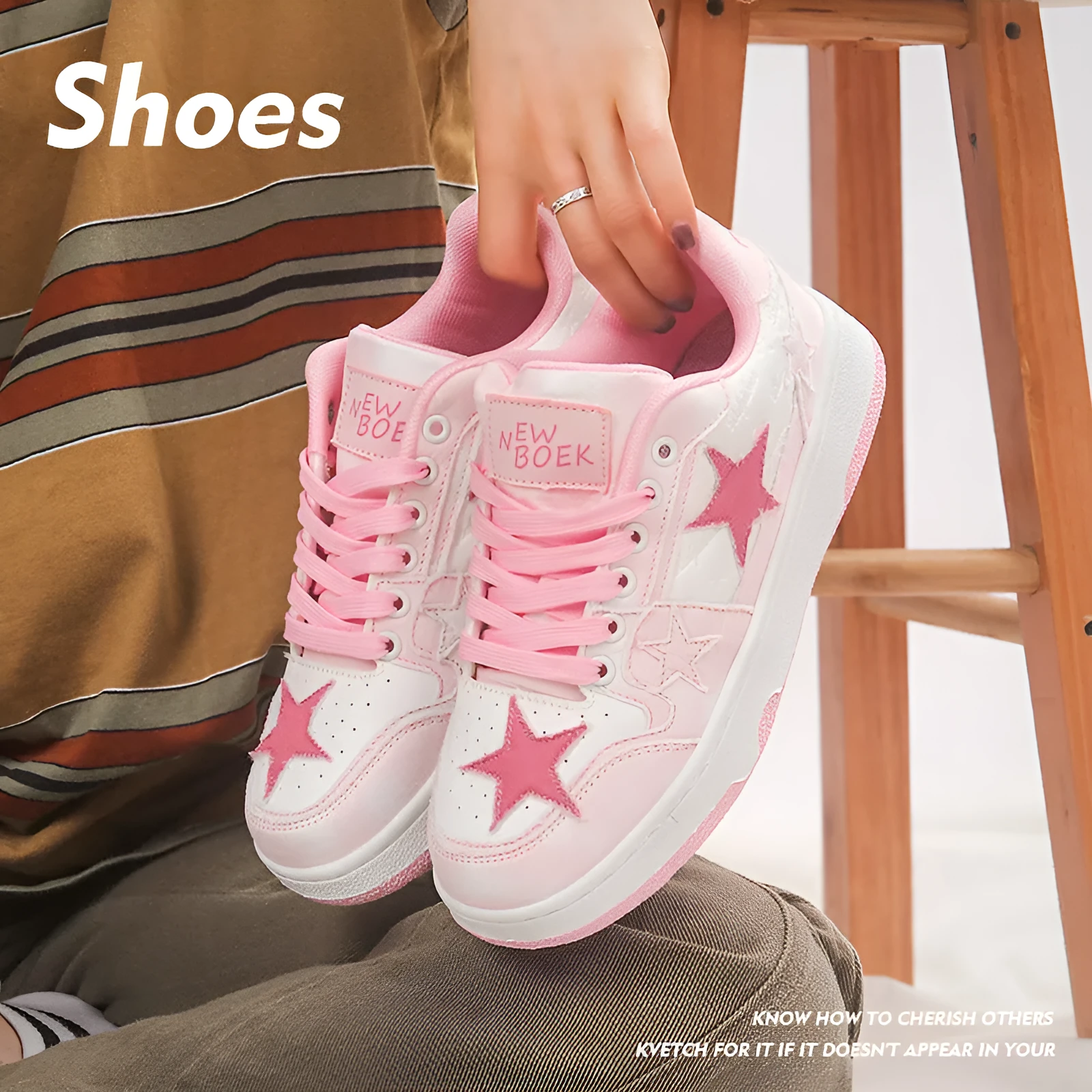 A pair of denim skate shoes with lace-up front, round toe, and flat mid-heel, shown in black.