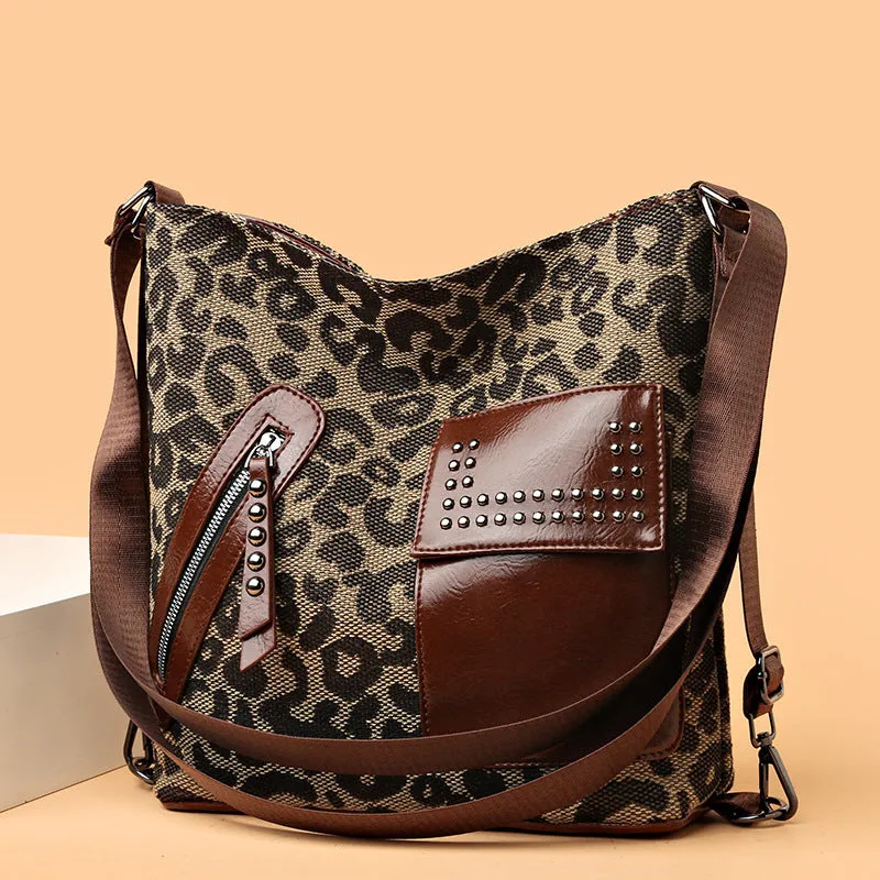 Medium houndstooth nylon backpack for women with rivet design and zipper opening in Leopard Pattern