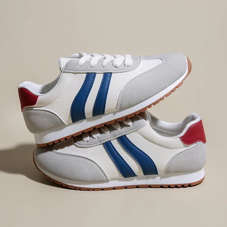 Blue and grey Cortez stripe pattern casual shoes with round toe and flat heel design