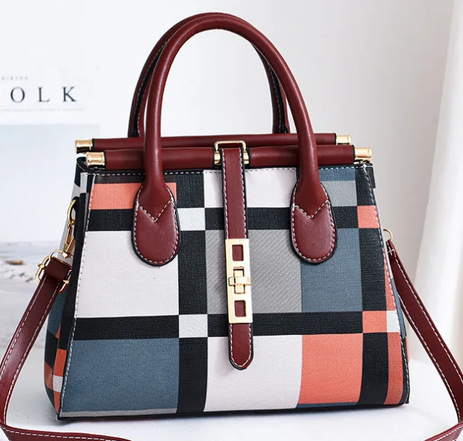 Women's large capacity PU leather Boston handbag in horizontal square shape with soft handle and belt decoration