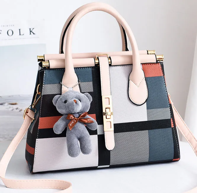 Women's large capacity PU leather Boston handbag in horizontal square shape with soft handle and belt decoration