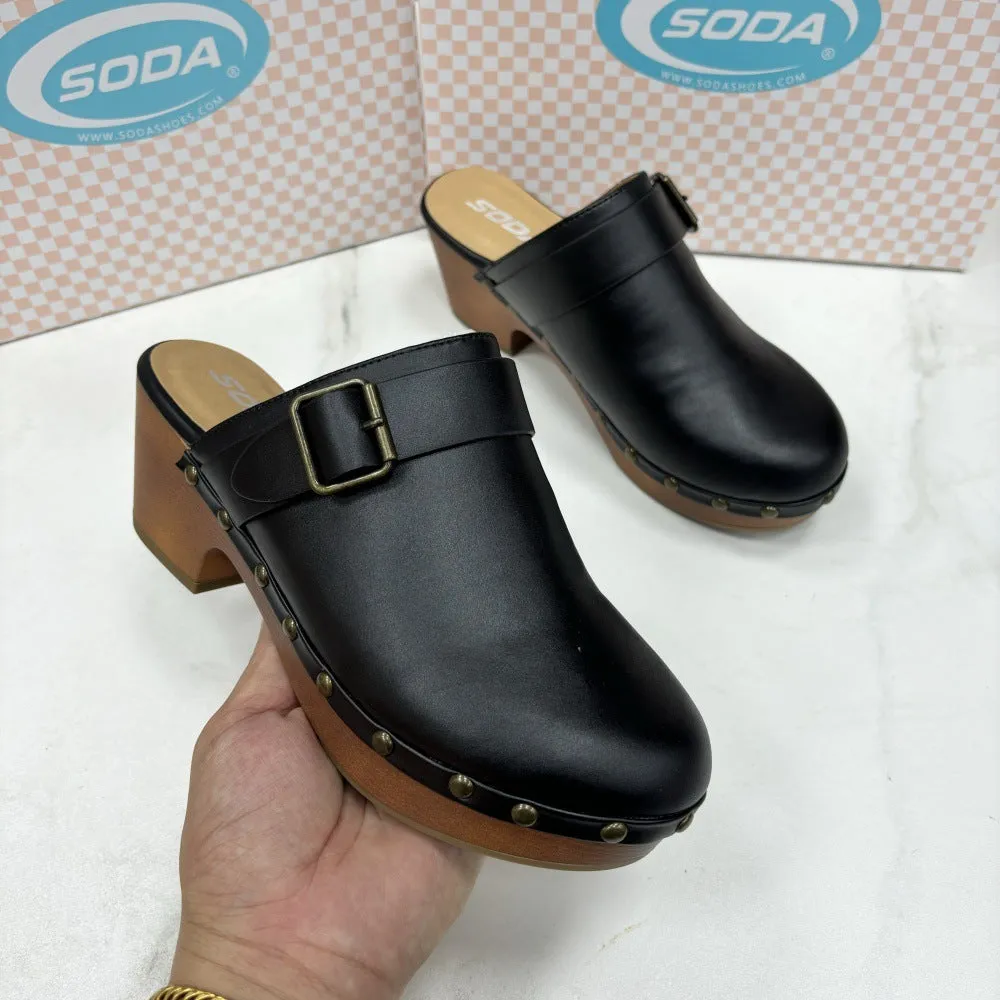 Retro-style ladies' slippers with a chunky heel, closed toe, round head, and decorative rivet details in black or dark brown.