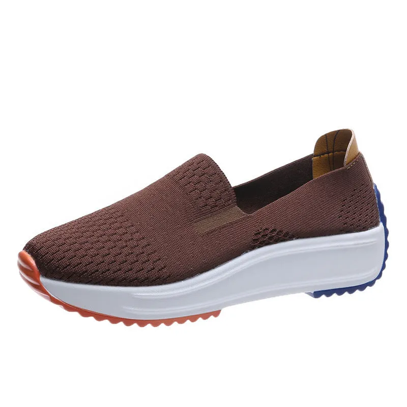 Women's lightweight mesh running shoes in white with composite sole, side view