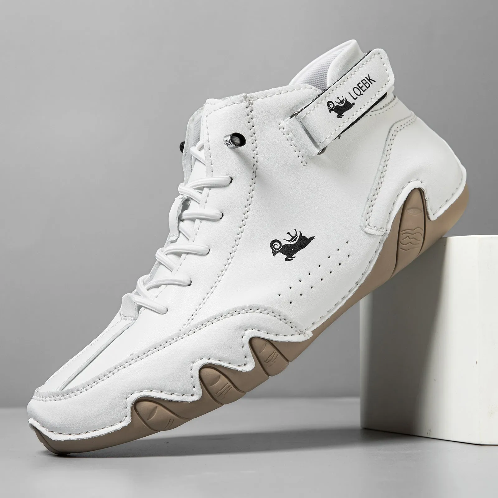 Men's brown high-top Martin boot with lace-up front, round toe, and flat rubber sole on a white background