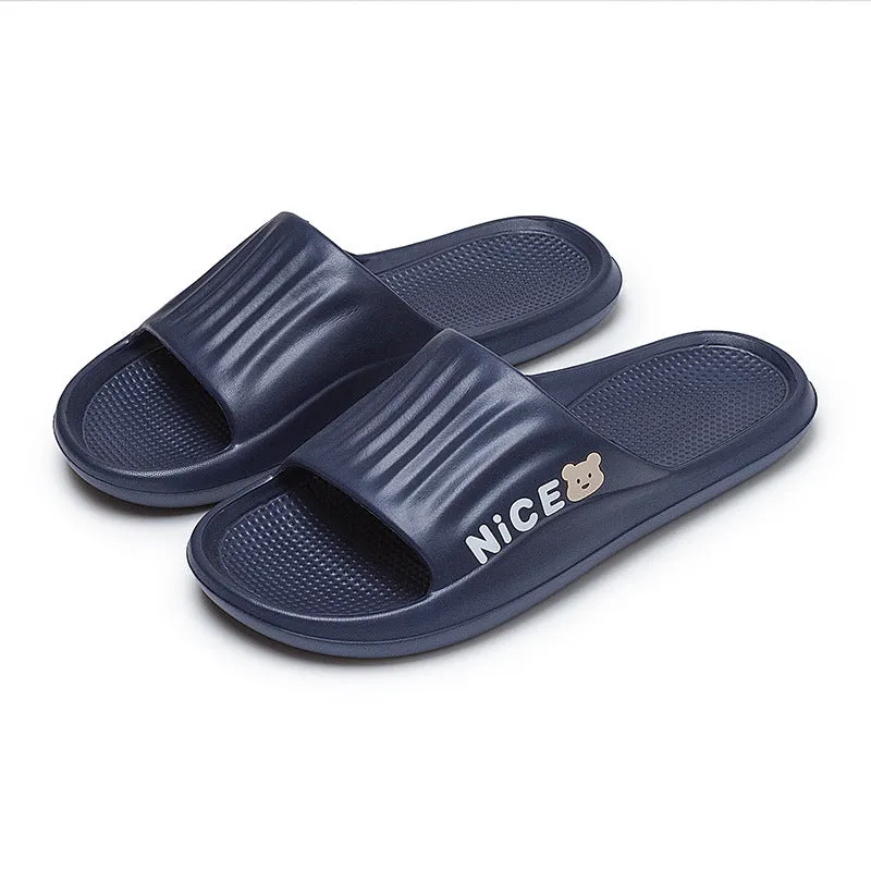 Adult unisex EVA cartoon pattern flip flop slippers in black, shown from above.