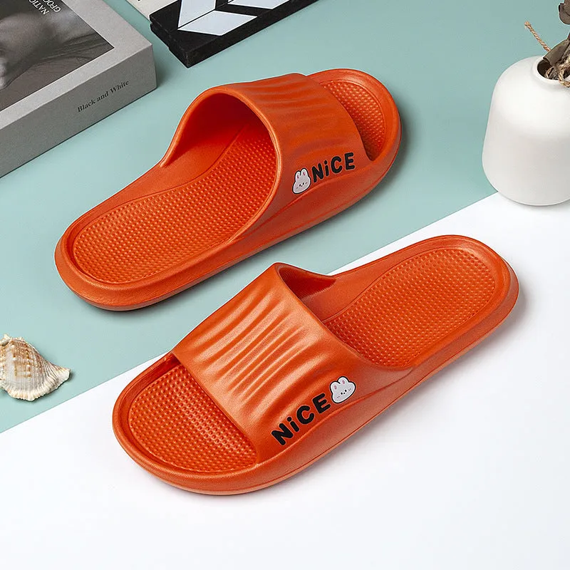 Adult unisex EVA cartoon pattern flip flop slippers in black, shown from above.