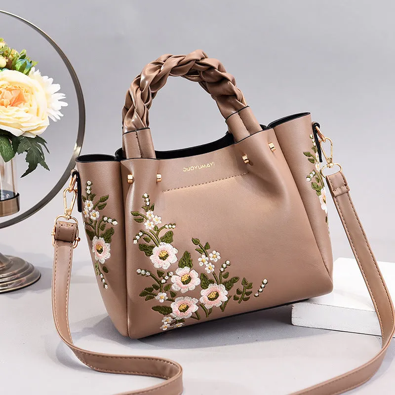 Medium PU leather drawstring tote bag for women in khaki, with shoulder strap and car stitching detail