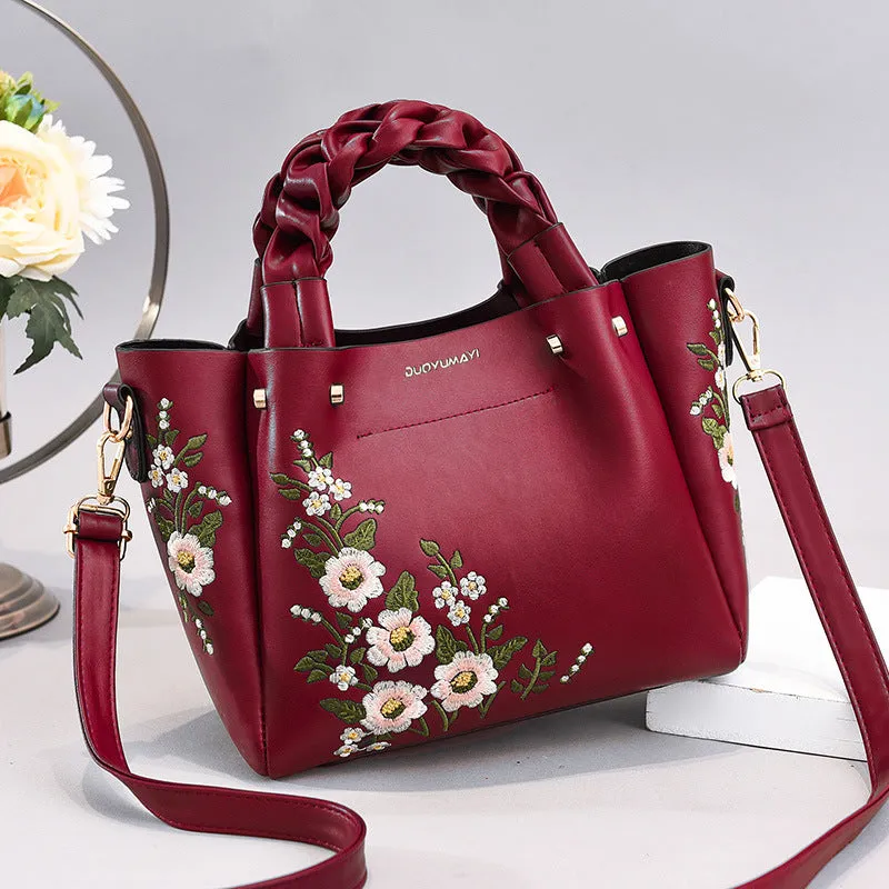 Medium PU leather drawstring tote bag for women in khaki, with shoulder strap and car stitching detail