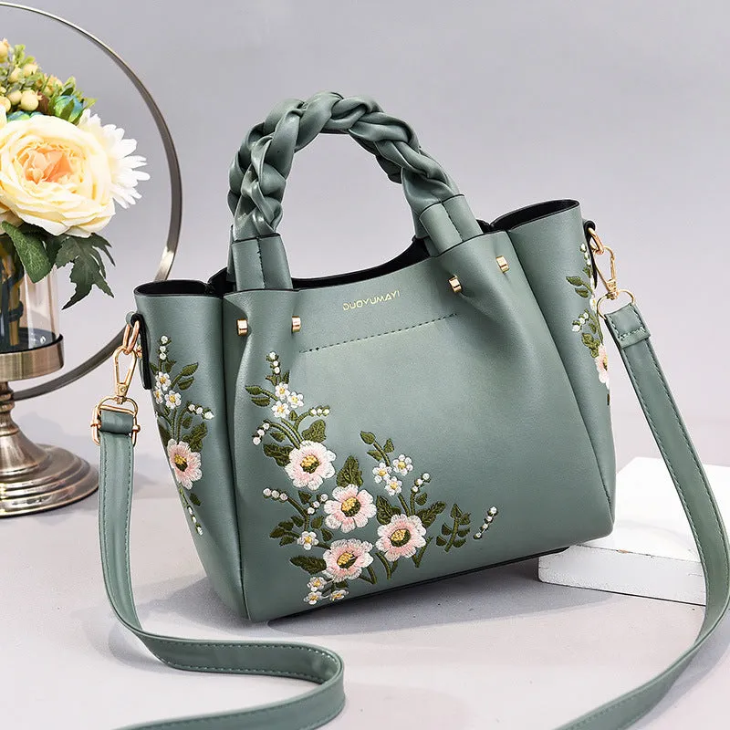 Medium PU leather drawstring tote bag for women in khaki, with shoulder strap and car stitching detail