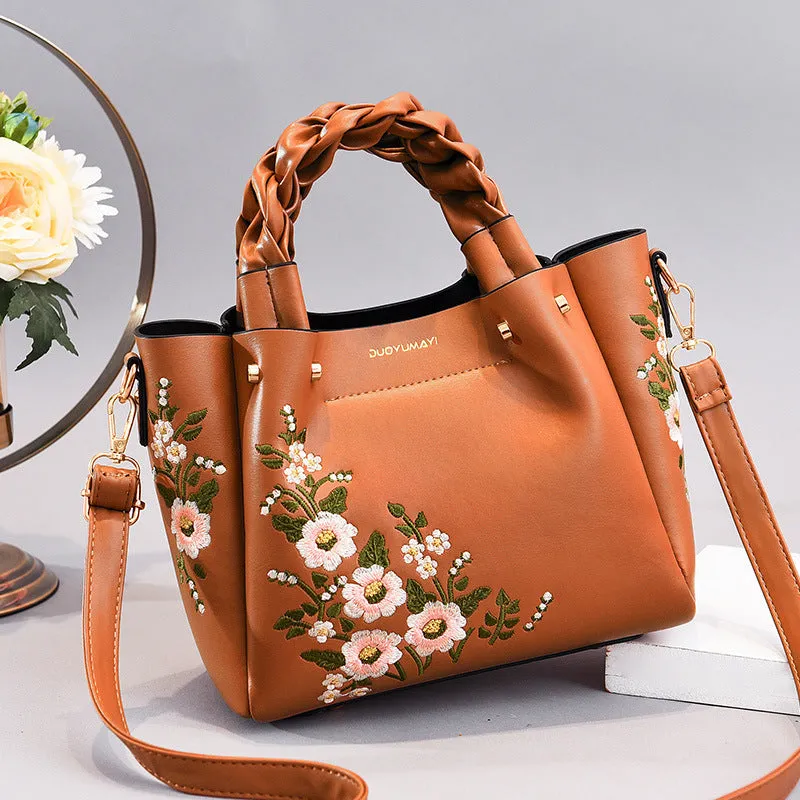 Medium PU leather drawstring tote bag for women in khaki, with shoulder strap and car stitching detail