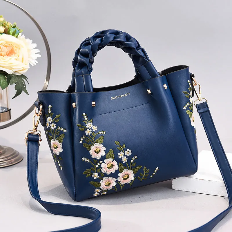 Medium PU leather drawstring tote bag for women in khaki, with shoulder strap and car stitching detail
