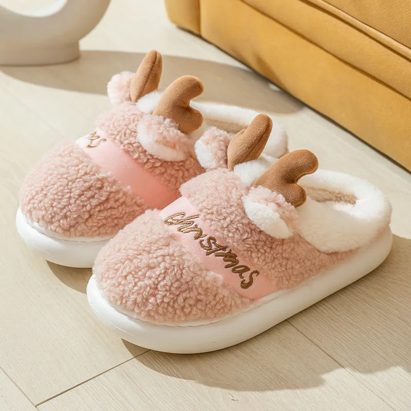Christmas winter home slippers with suede upper and EVA sole in antler pink colour