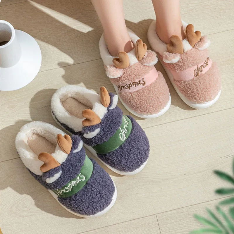 Christmas winter home slippers with suede upper and EVA sole in antler pink colour