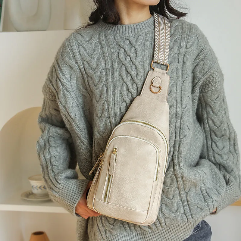 Soft brown PU leather women's crossbody messenger bag with an open front pocket and adjustable strap.