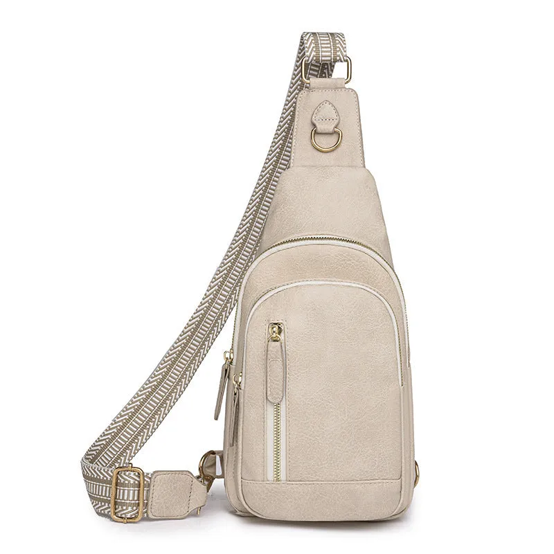 Soft brown PU leather women's crossbody messenger bag with an open front pocket and adjustable strap.