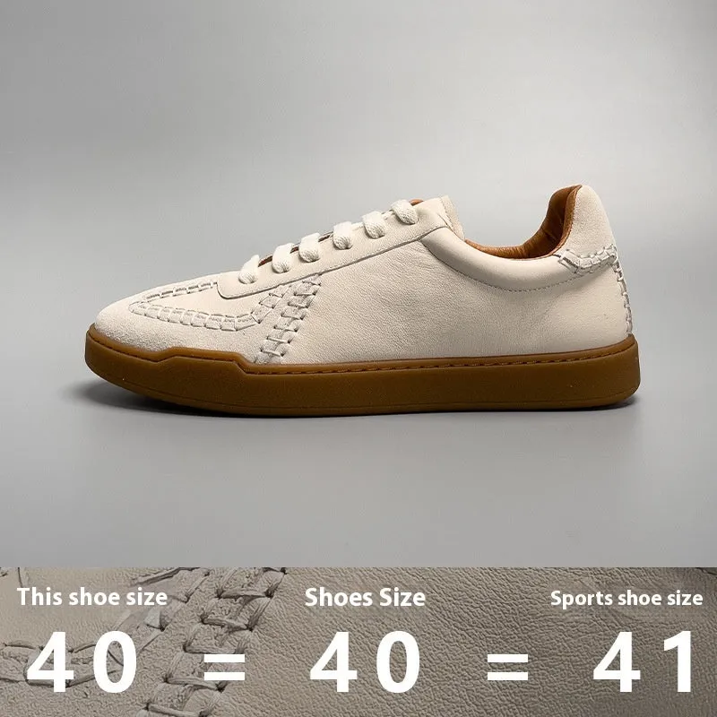 Men's beige genuine leather low-cut sneakers with white lace-up front and rubber sole on neutral background