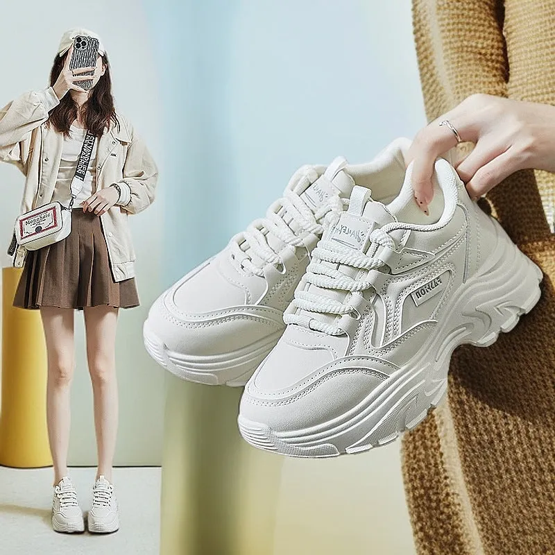 Breathable sports height increasing low-top shoes for women in black with T-shaped tie and rubber sole