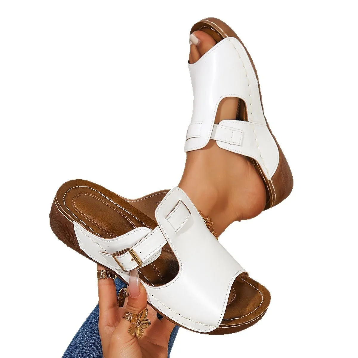 Women's light pink Magic Stick casual slippers with a fish mouth toe design on a white background.