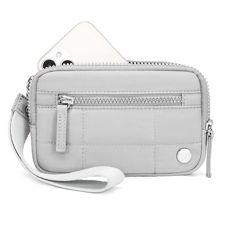 Waterproof quilted women's handbag with transparent deck section in solid colour
