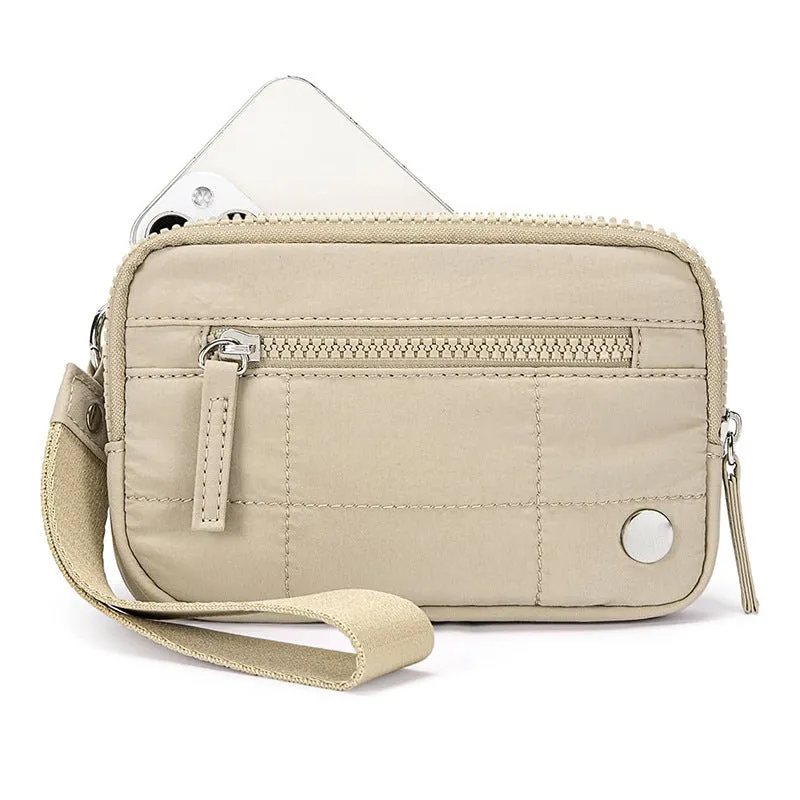 Waterproof quilted women's handbag with transparent deck section in solid colour