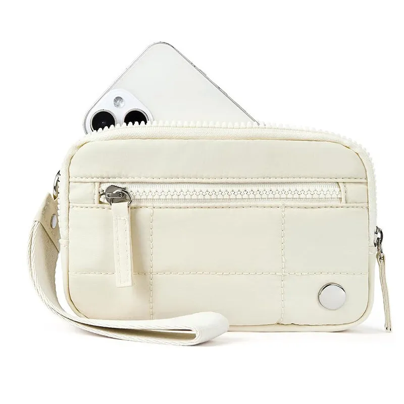 Waterproof quilted women's handbag with transparent deck section in solid colour