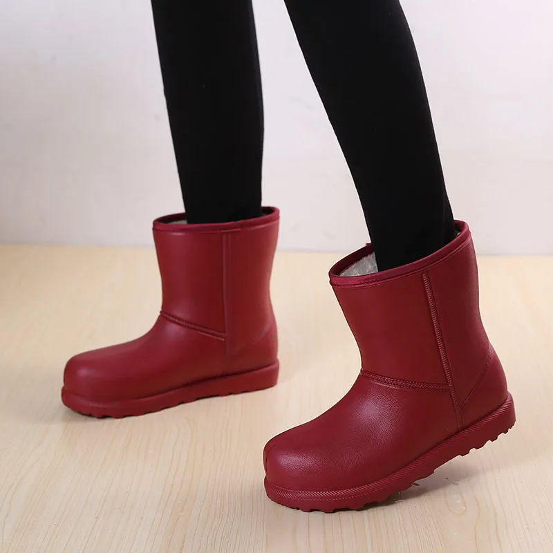 Women's mid-calf EVA waterproof snow boots with velvet lining, platform heel, round toe, in black