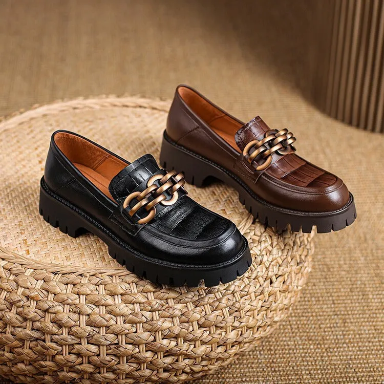 Retro platform loafers in brown cowhide patterned leather with a round toe and rubber sole