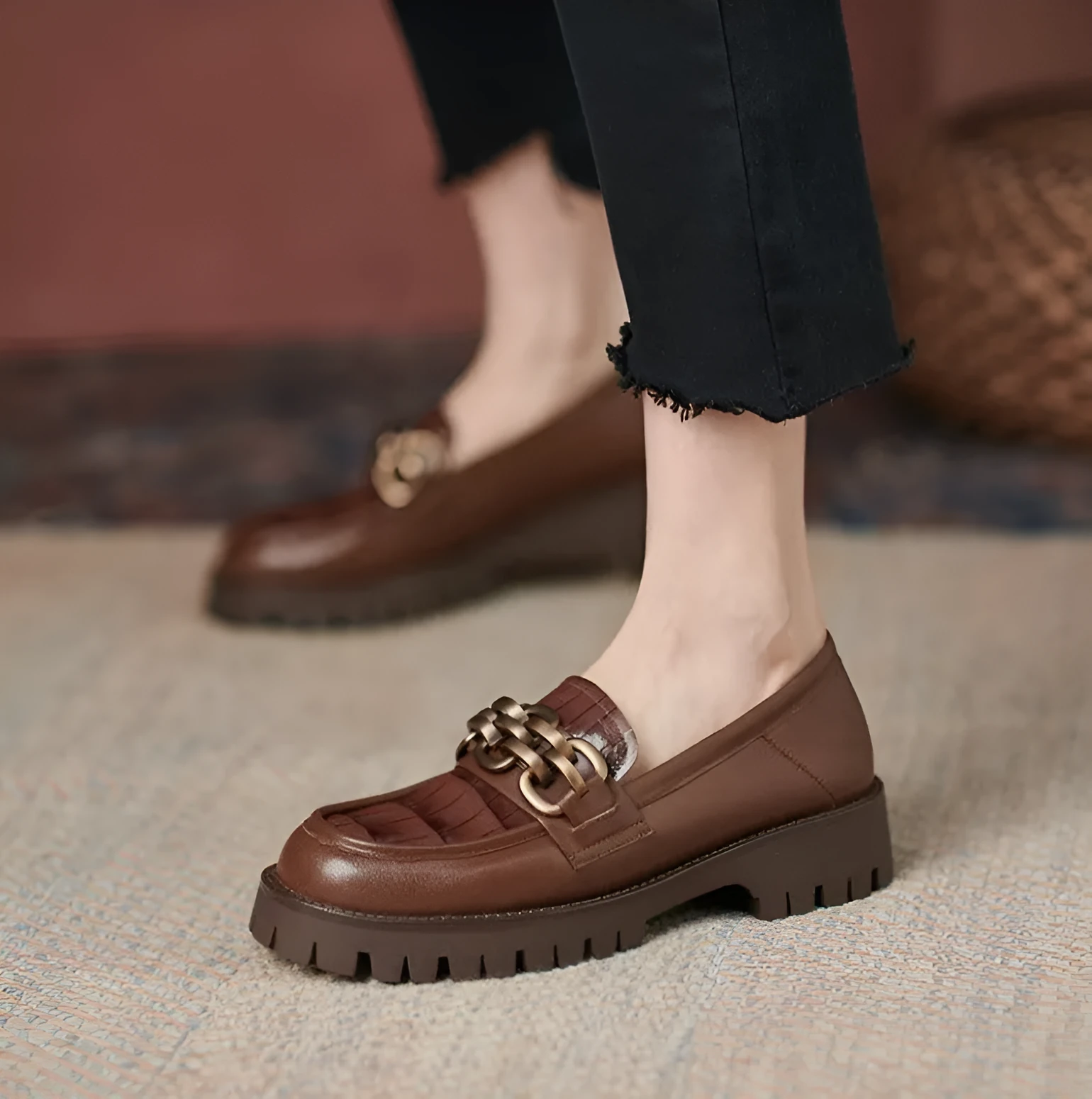 Retro platform loafers in brown cowhide patterned leather with a round toe and rubber sole