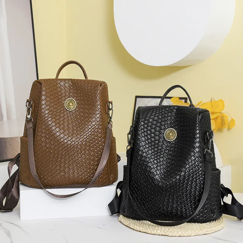 Women's black anti-theft backpack with waterproof PU material and multiple organisational compartments