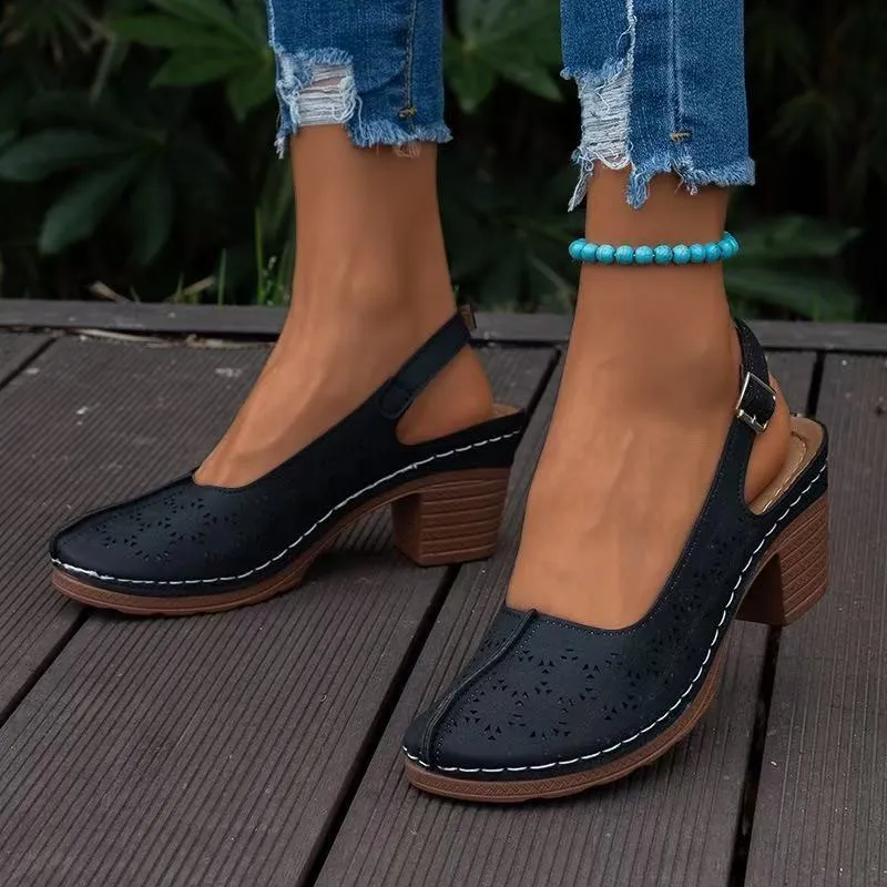 Women's closed toe wedge sandals in black with round toe design and rubber sole