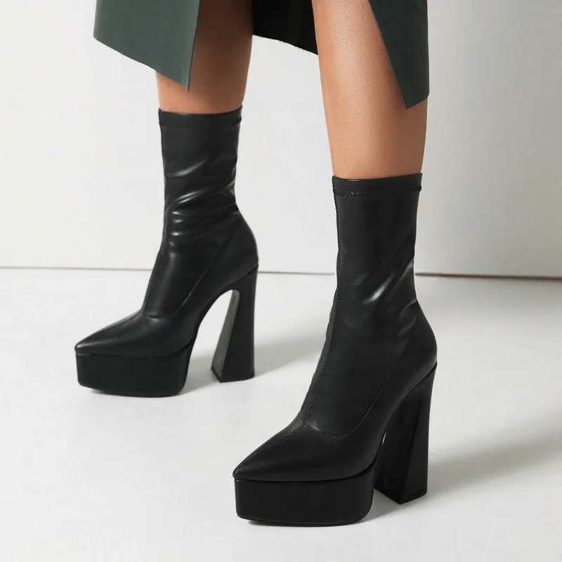 Women's black platform booties with thick super high heel and short stout heel
