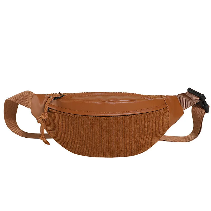 Corduroy crossbody bag in brown with oval shape, slit pocket, and crossbody strap