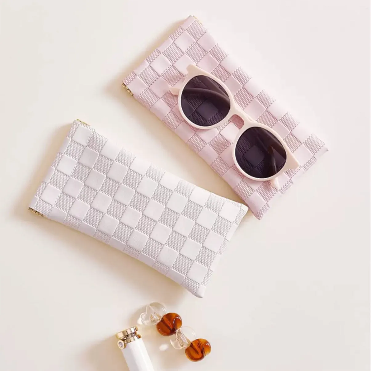 Leather glasses case with automatic snap closure in a colour option, lying flat