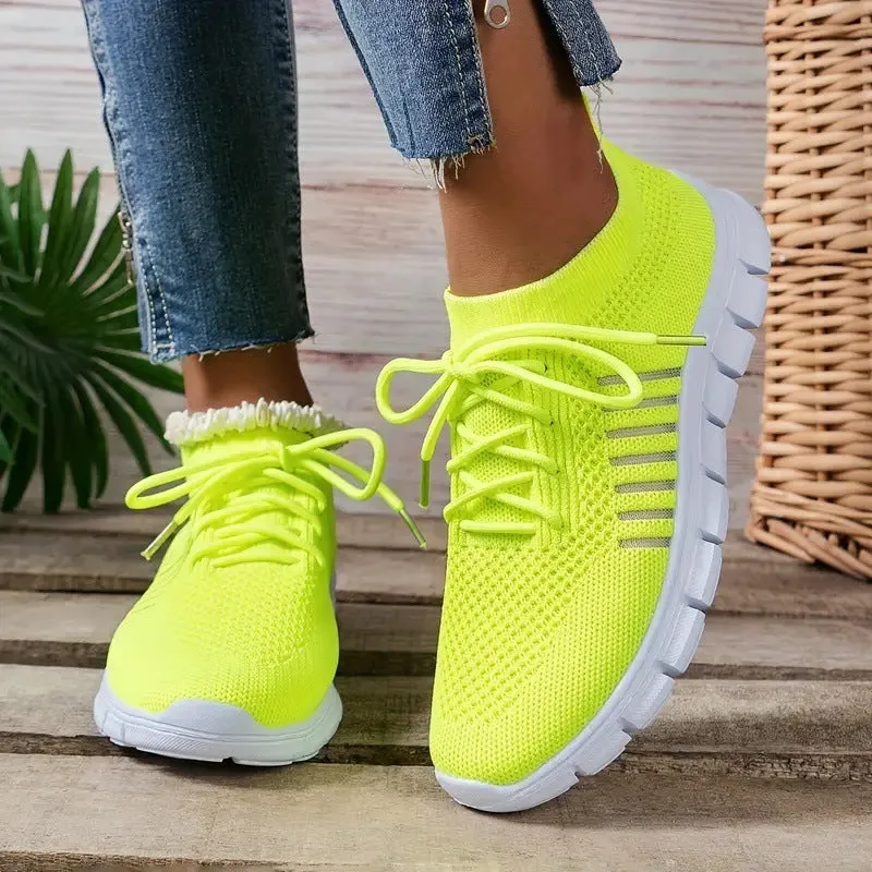 Women's breathable mesh sports flats in multiple colours with front-tie lacing and EVA sole