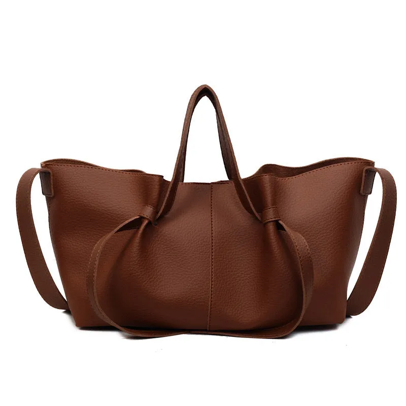 Large capacity one-shoulder crossbody bag in soft PU leather with sewing line detail, black colour option