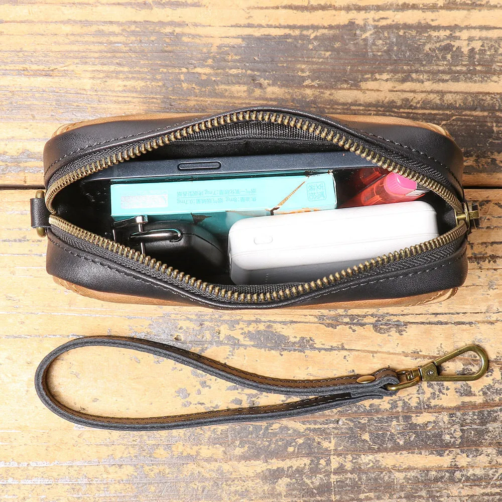 Unisex retro brown genuine leather messenger bag with artistic stitching and horizontal square shape on a plain background