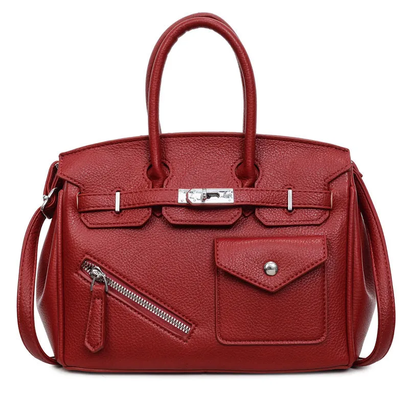 PU leather retro cross-body bag in solid colour with stitching, lock detail, and horizontal square shape