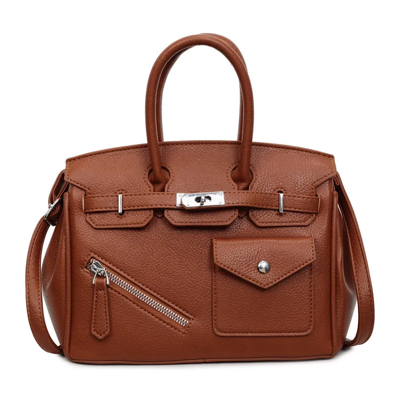 PU leather retro cross-body bag in solid colour with stitching, lock detail, and horizontal square shape