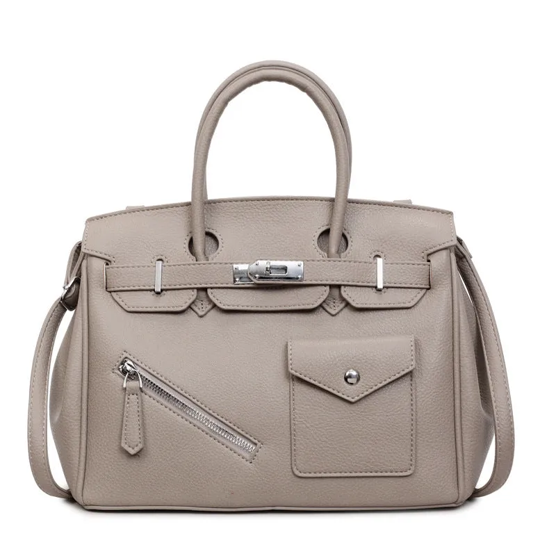 PU leather retro cross-body bag in solid colour with stitching, lock detail, and horizontal square shape