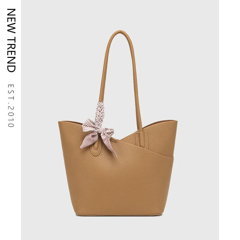 PU large-capacity casual shoulder handbag in brown with vertical square shape and sewing line detailing