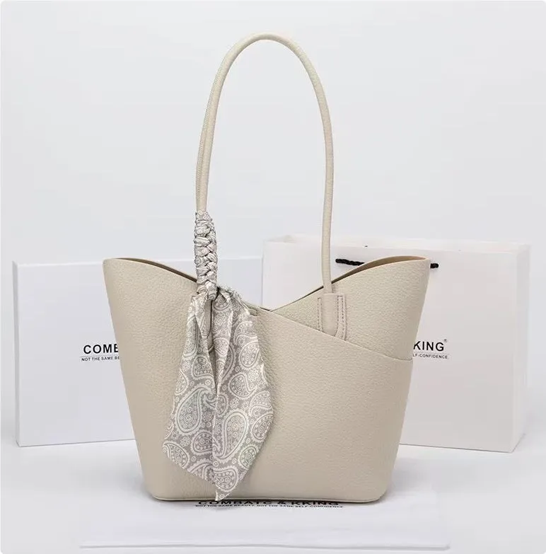 PU large-capacity casual shoulder handbag in brown with vertical square shape and sewing line detailing