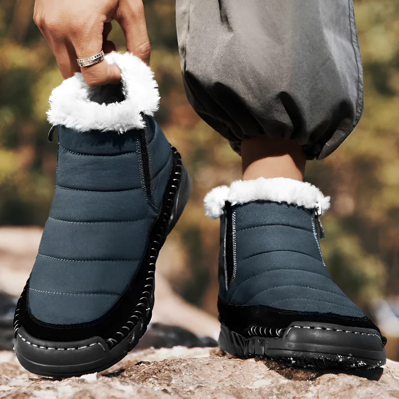 Men's plus size snow boot in black with round toe, cotton upper, and rubber sole.