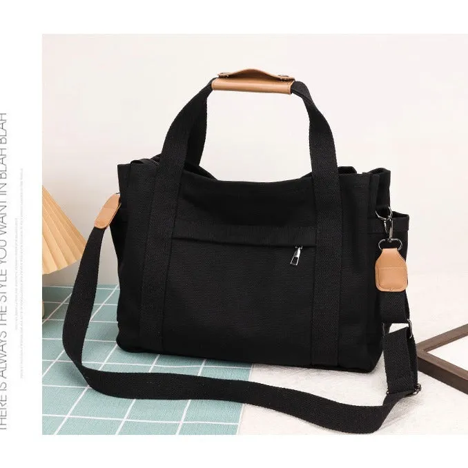 Canvas tote bag with multiple internal pockets including computer pocket, shown in horizontal square shape