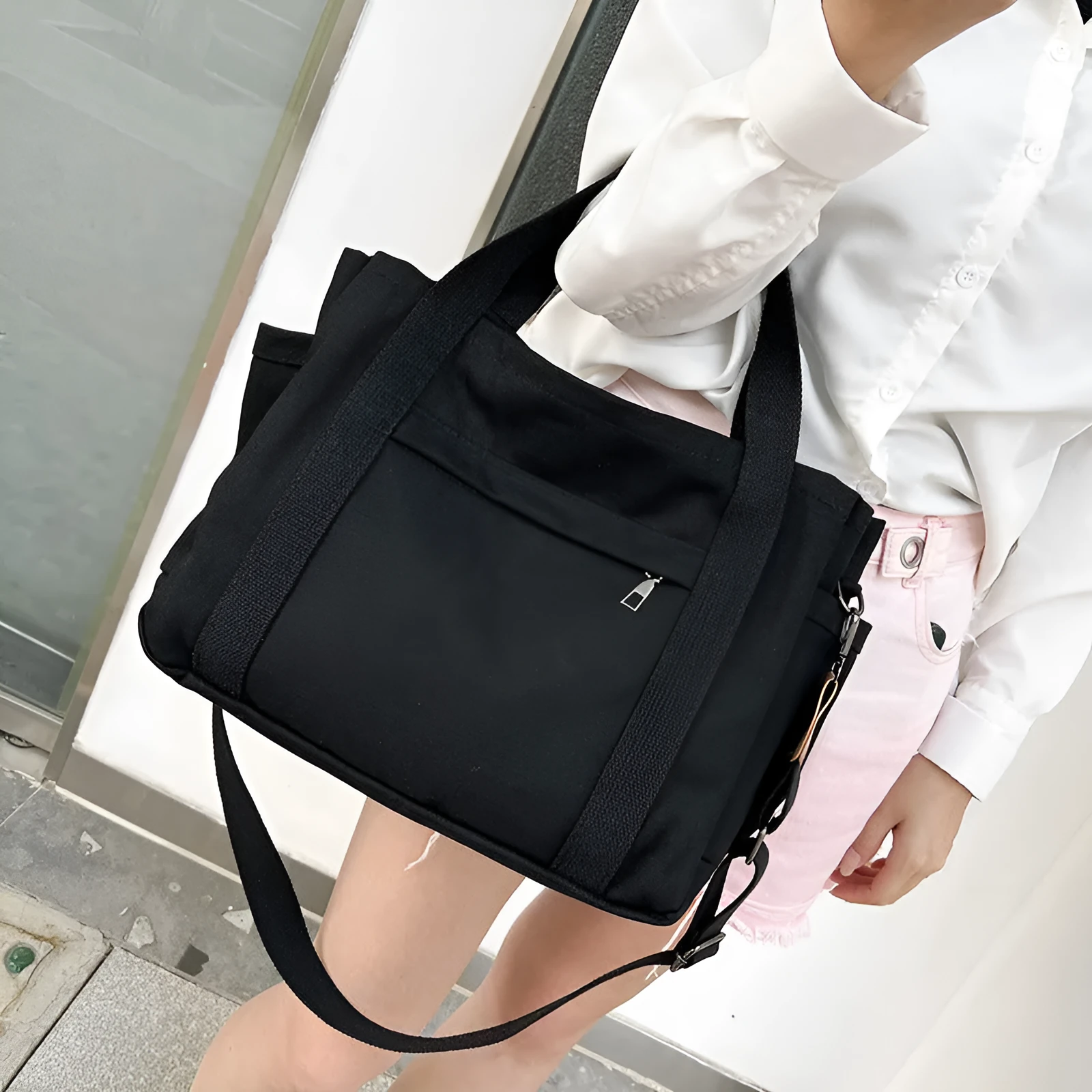 Canvas tote bag with multiple internal pockets including computer pocket, shown in horizontal square shape