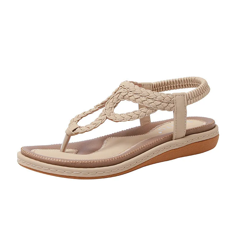 Women's woven flat sandals in solid colour low top with rubber sole, available in black apricot or sapphire blue